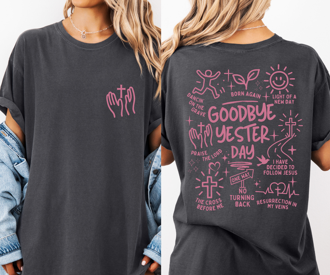 Black t-shirt with pink religious-themed graphics on a white background