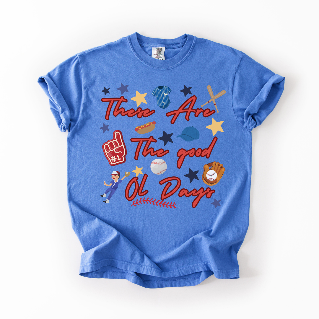 Blue t-shirt with colorful graphics and text on a white background